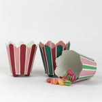 three striped cachepots in shades of pink, red and green from madcap cottage