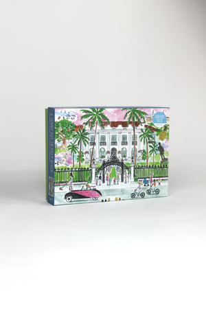 a 1000 piece jigsaw puzzle featuring an illustration of the a white building in palm beach florida. 