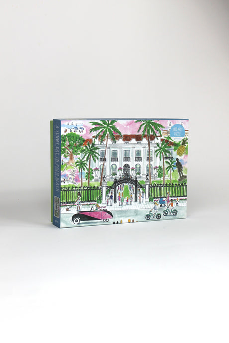 a 1000 piece jigsaw puzzle featuring an illustration of the a white building in palm beach florida. 