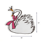 white swan placemat with gold crown and pink bow, 18" x 14", shown on a white background.