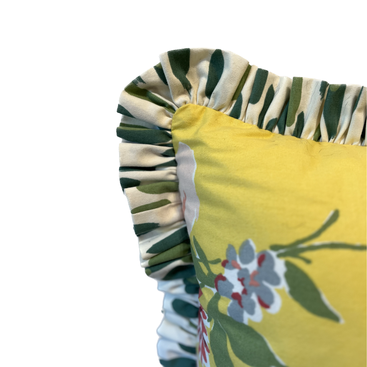 Swans Island daffodil yellow floral pillow with Club House ruffled contrast flange trim