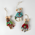 Three felt mouse ornaments dressed in colorful holiday sweaters—one with a snowman, one with a wreath, and one with a Christmas tree—each holding a gift.