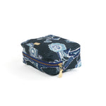 a large Temple Garden toiletry bag in navy blue features light blue floral motif.