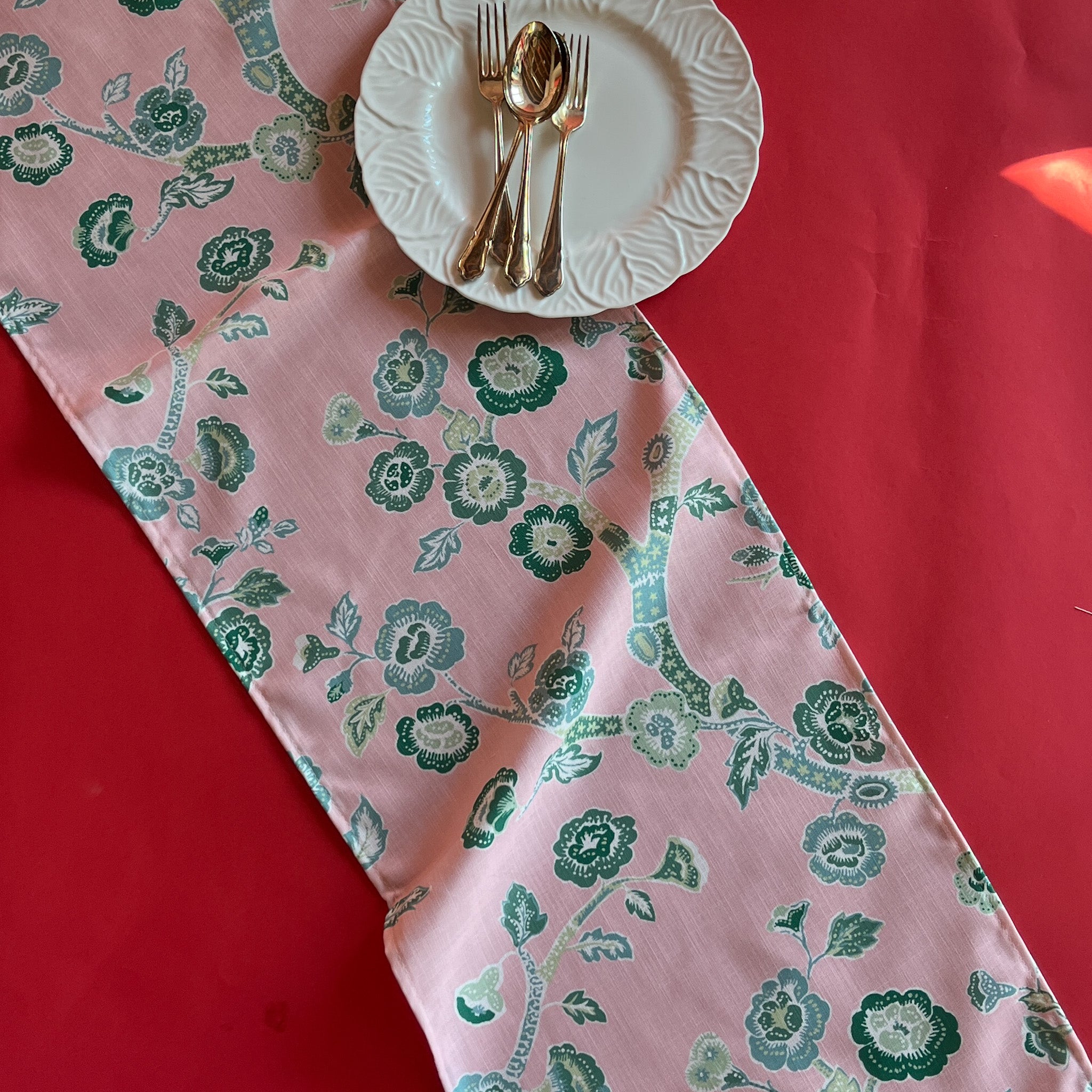 Temple Garden  Pink & green chinoiserie cloth Table Runner on a red background