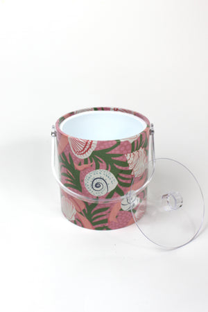 Top view of Shell Seekers, a pink acrylic ice bucket from madcap cottage covered in shell and seaweed motifs