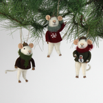 Three felt mouse ornaments wearing cozy sweaters with festive designs—a snowman, a tree, and a snowflake—each topped with a tiny acorn cap and ready to hang.
