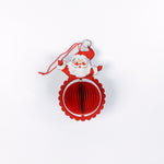 folding paper Santa Christmas ornaments in vibrant red with honeycomb-style bases