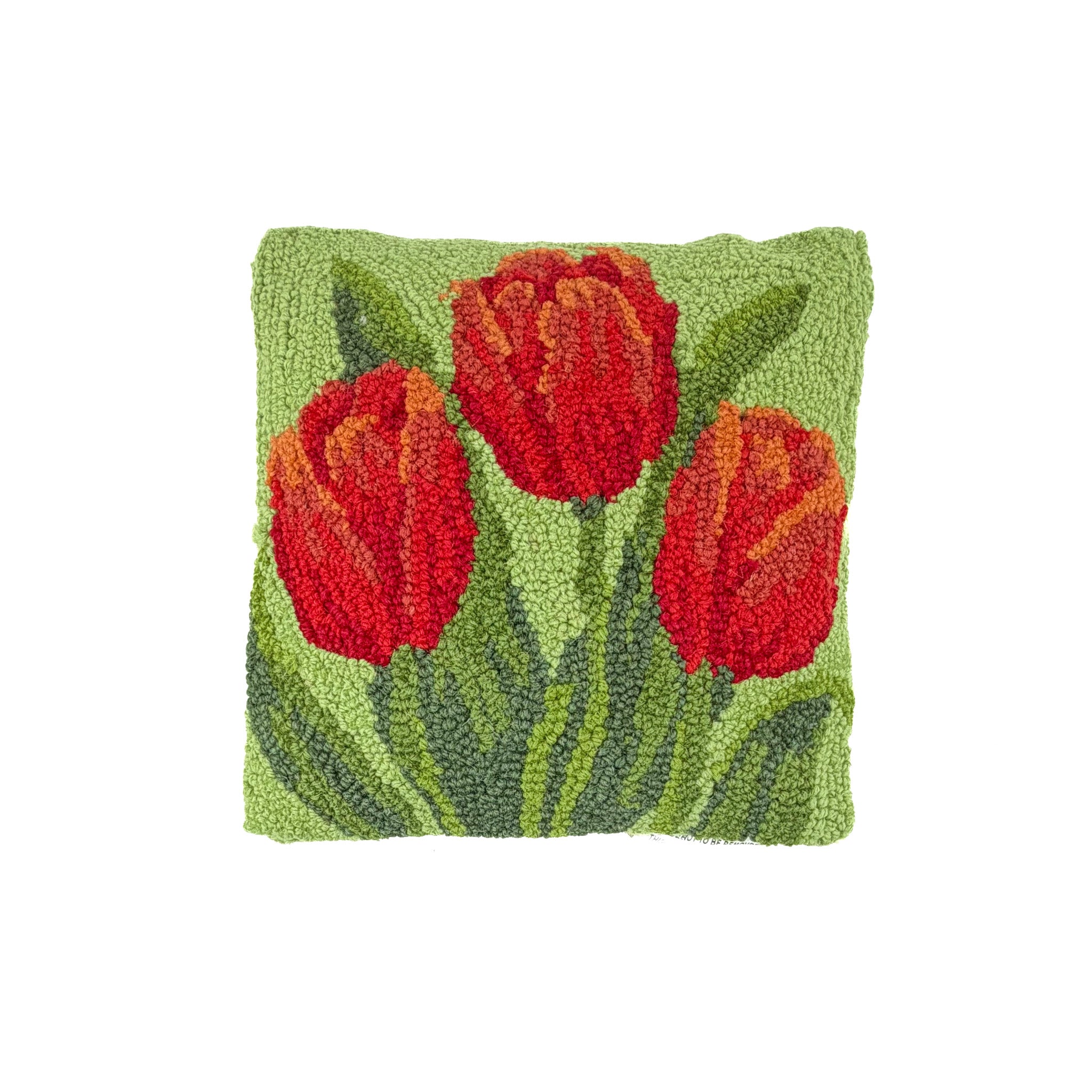 Front hooked pillow with red tulip floral design on green background