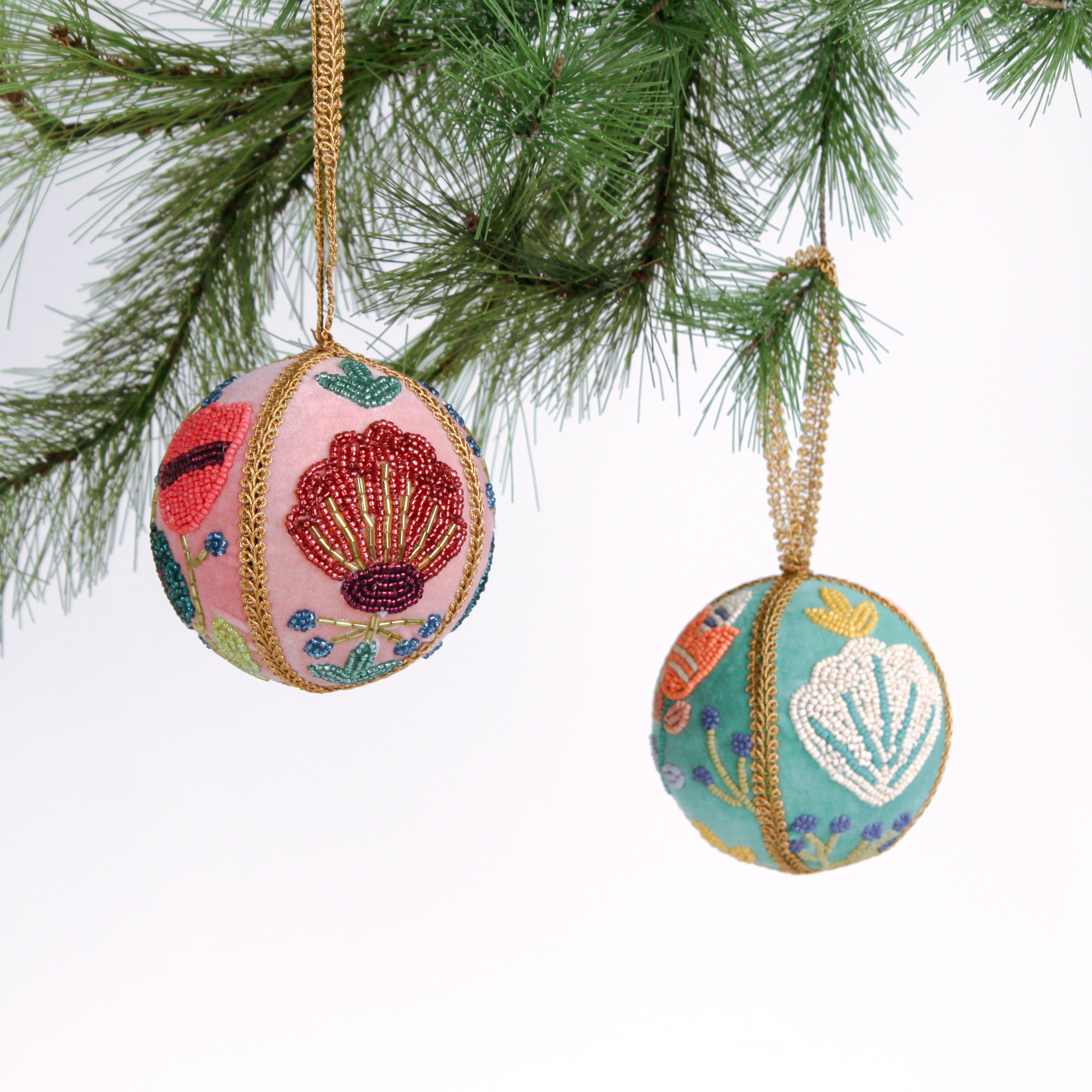 velvet Christmas ball ornaments beautifully hand-embroidered with beaded floral designs and finished with gold braided trim and hanging loops
