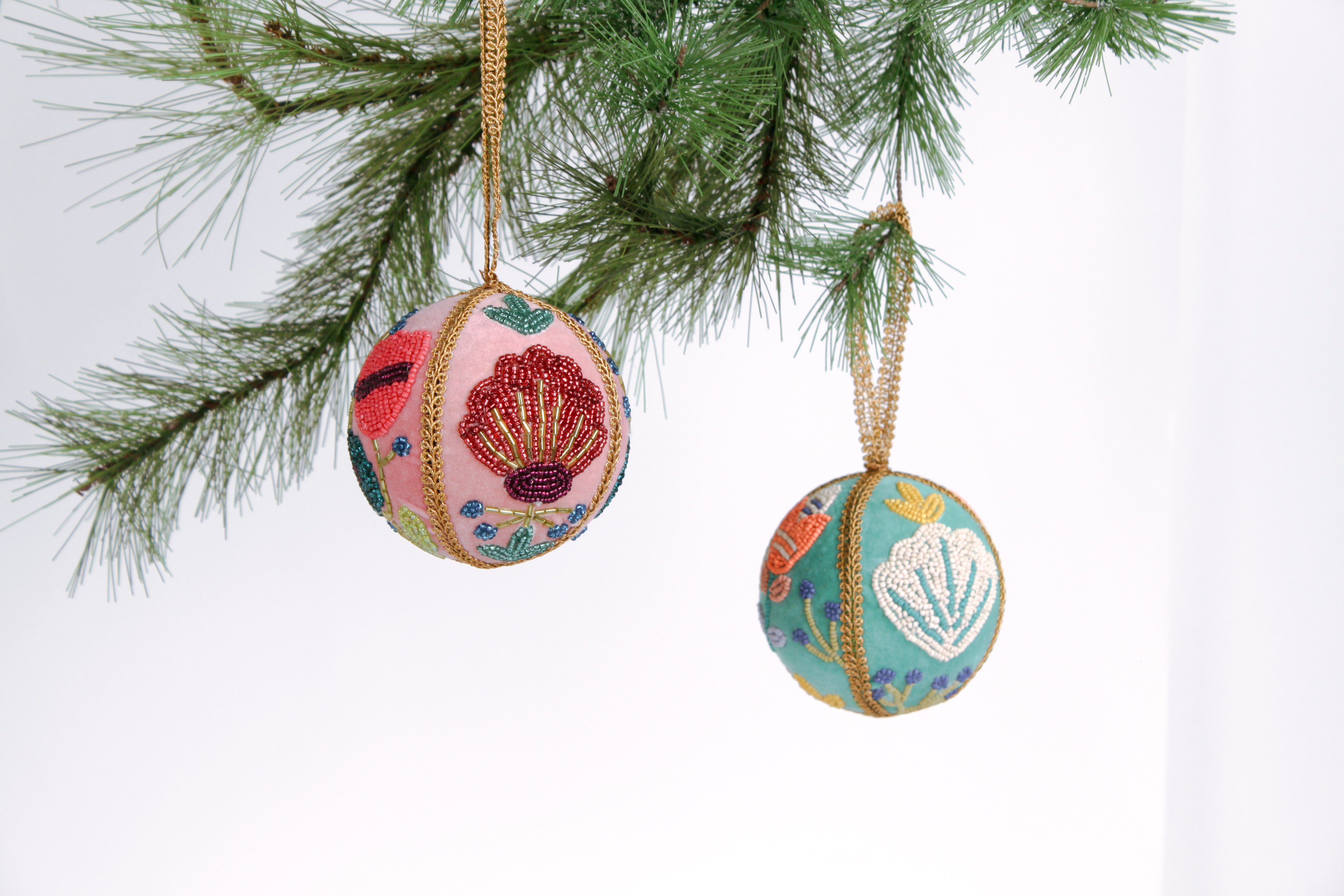 velvet Christmas ball ornaments beautifully hand-embroidered with beaded floral designs and finished with gold braided trim and hanging loops
