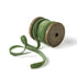 a light green Velvet Ribbon on Wood Spool in a white background