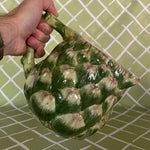 Vintage ceramic water pitcher with sculpted green artichoke design and handle