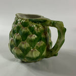 Vintage ceramic water pitcher with sculpted green artichoke design and handle