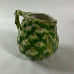 Vintage ceramic water pitcher with sculpted green artichoke design and handle