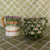 Vintage ceramic water pitcher with sculpted green artichoke design and handle