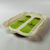 Vintage ceramic serving platter featuring raised green asparagus bundles with decorative detail
