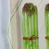 close up Vintage ceramic serving platter featuring raised green asparagus bundles with decorative detail