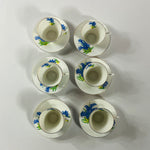 Top view Set of six vintage English bone china dessert plates with bluebell floral pattern and gold rim