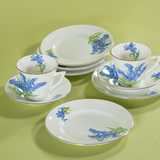 Vintage English bone china dessert set with bluebell floral pattern, cups, saucers, and plates