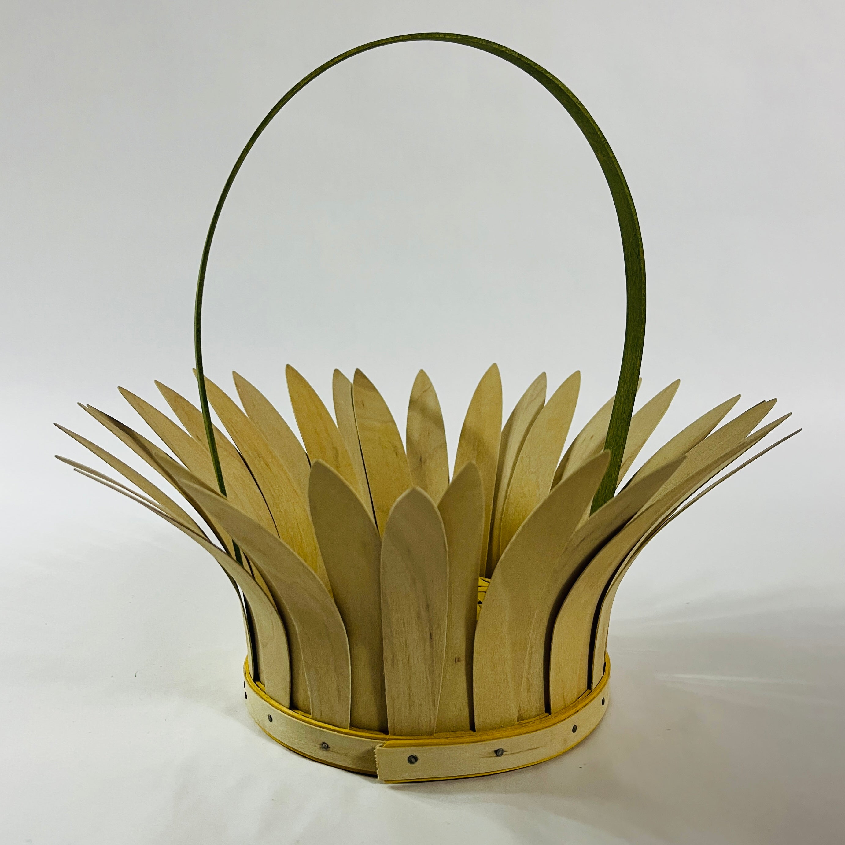 Vintage daisy-shaped wood basket with petal design and curved handle
