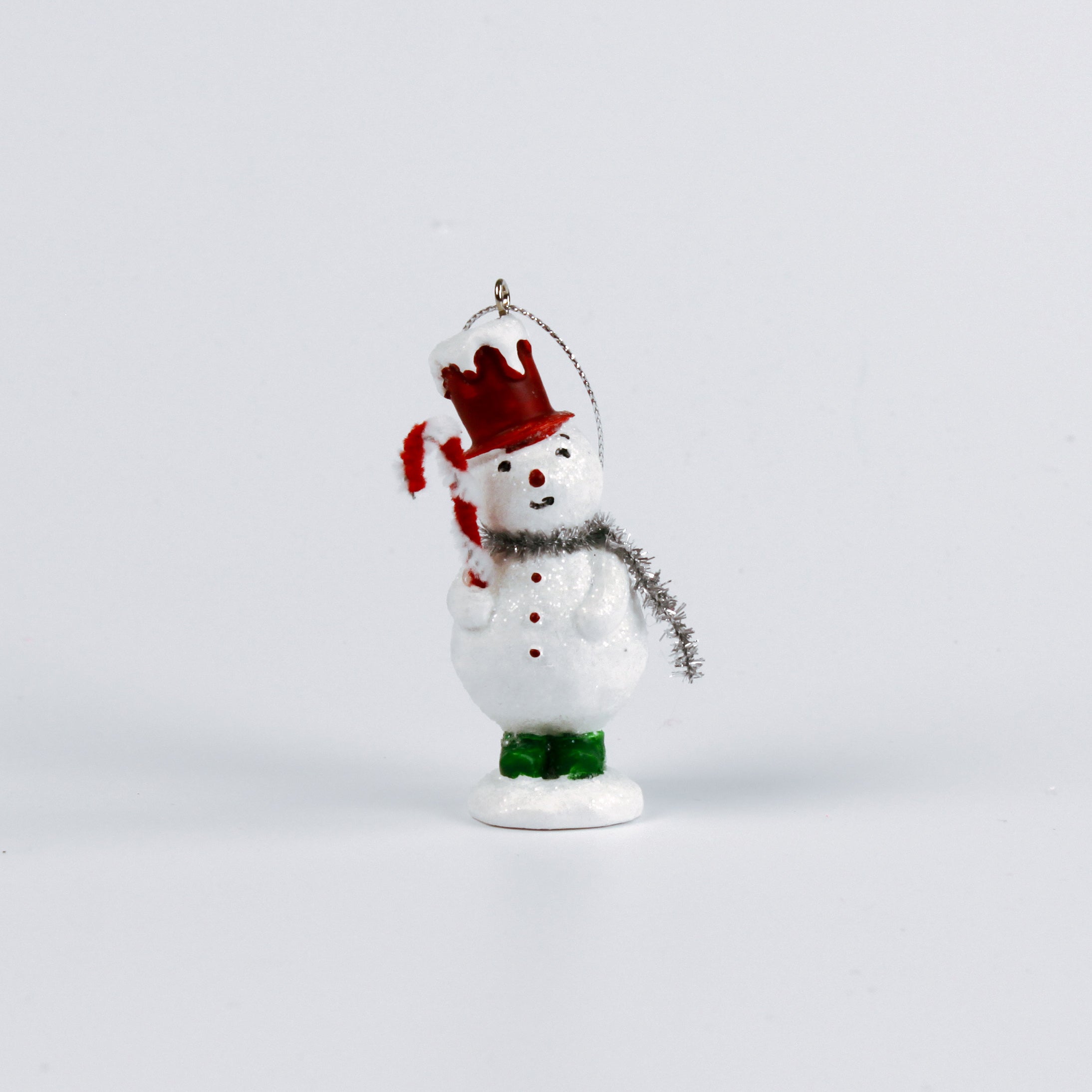 vintage-style snowman ornaments, wearing a colorful top hat and scarf