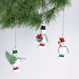 Set of three vintage-style snowman ornaments, each wearing a colorful top hat and scarf