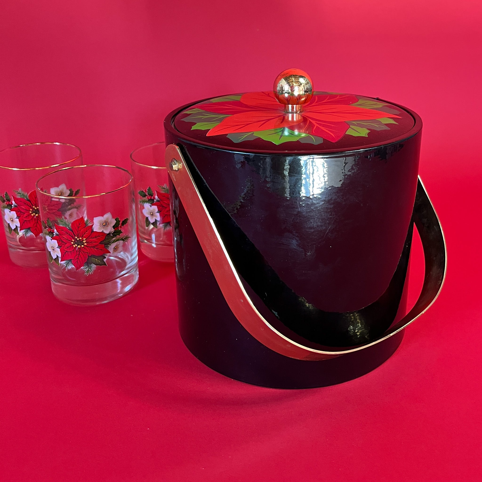 Vintage Christmas ice bucket with poinsettia motif lid and three matching glasses