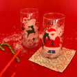 Vintage Santa Drinks Glasses, Set of 4. Santas and Reindeer dancing on the glass