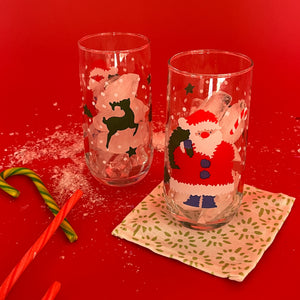Vintage Santa Drinks Glasses, Set of 4. Santas and Reindeer dancing on the glass