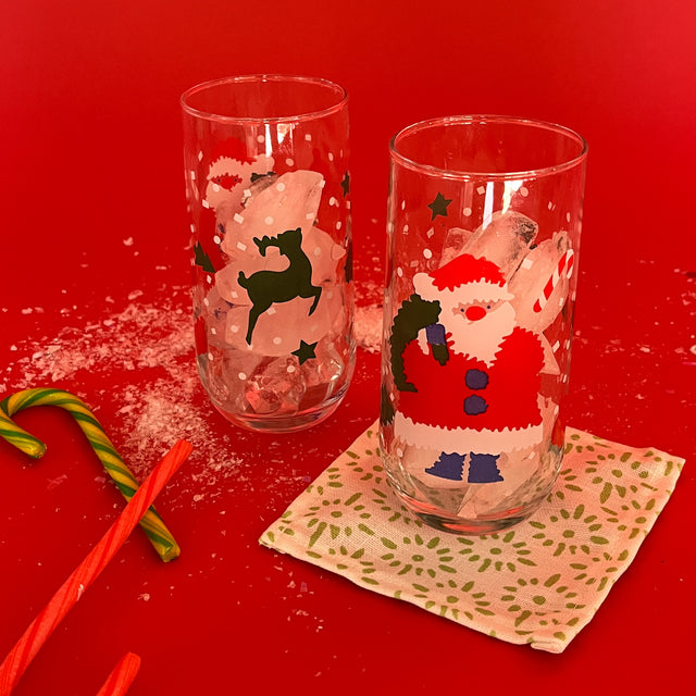 Vintage Santa Drinks Glasses, Set of 4. Santas and Reindeer dancing on the glass