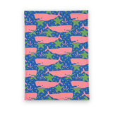 Whale of a Time cotton tea towel featuring playful pink whales on a vibrant blue background with green ocean-inspired details.