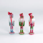 back of a set of three Wood Glitter Nutcracker Christmas Ornaments