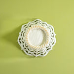 a white vintage italian ceramic basket