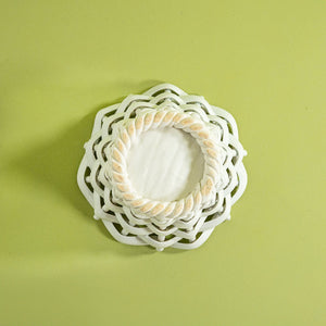 a white vintage italian ceramic basket