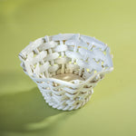 a white vintage italian ceramic basket
