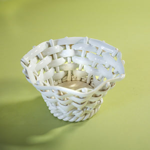 a white vintage italian ceramic basket