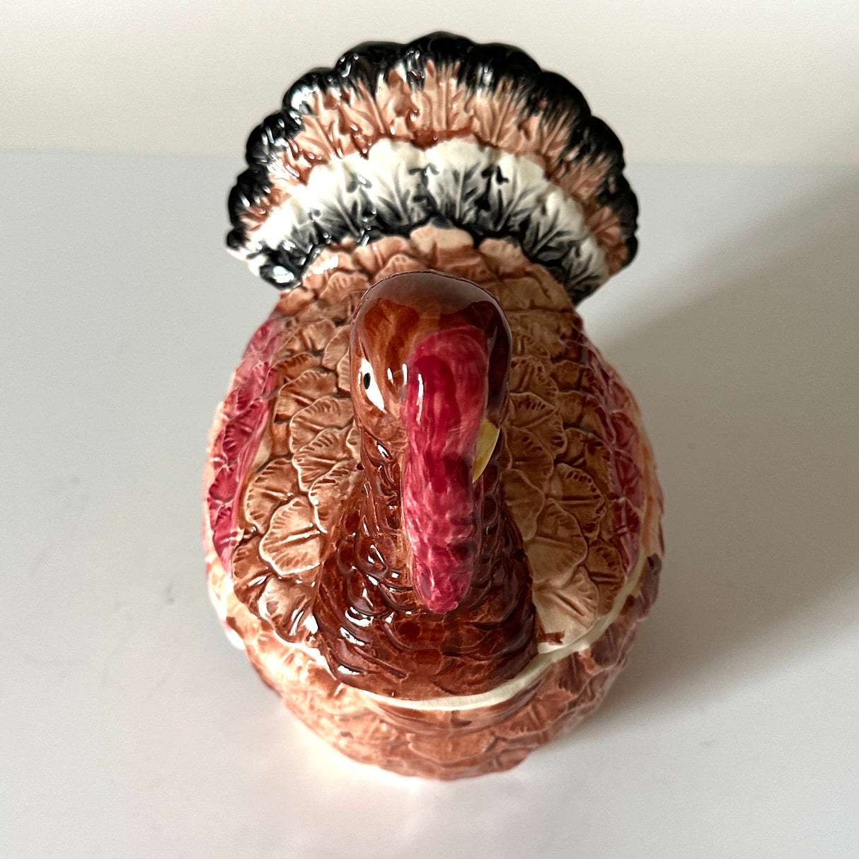 a ceramic turkey centerpiece photographed from above