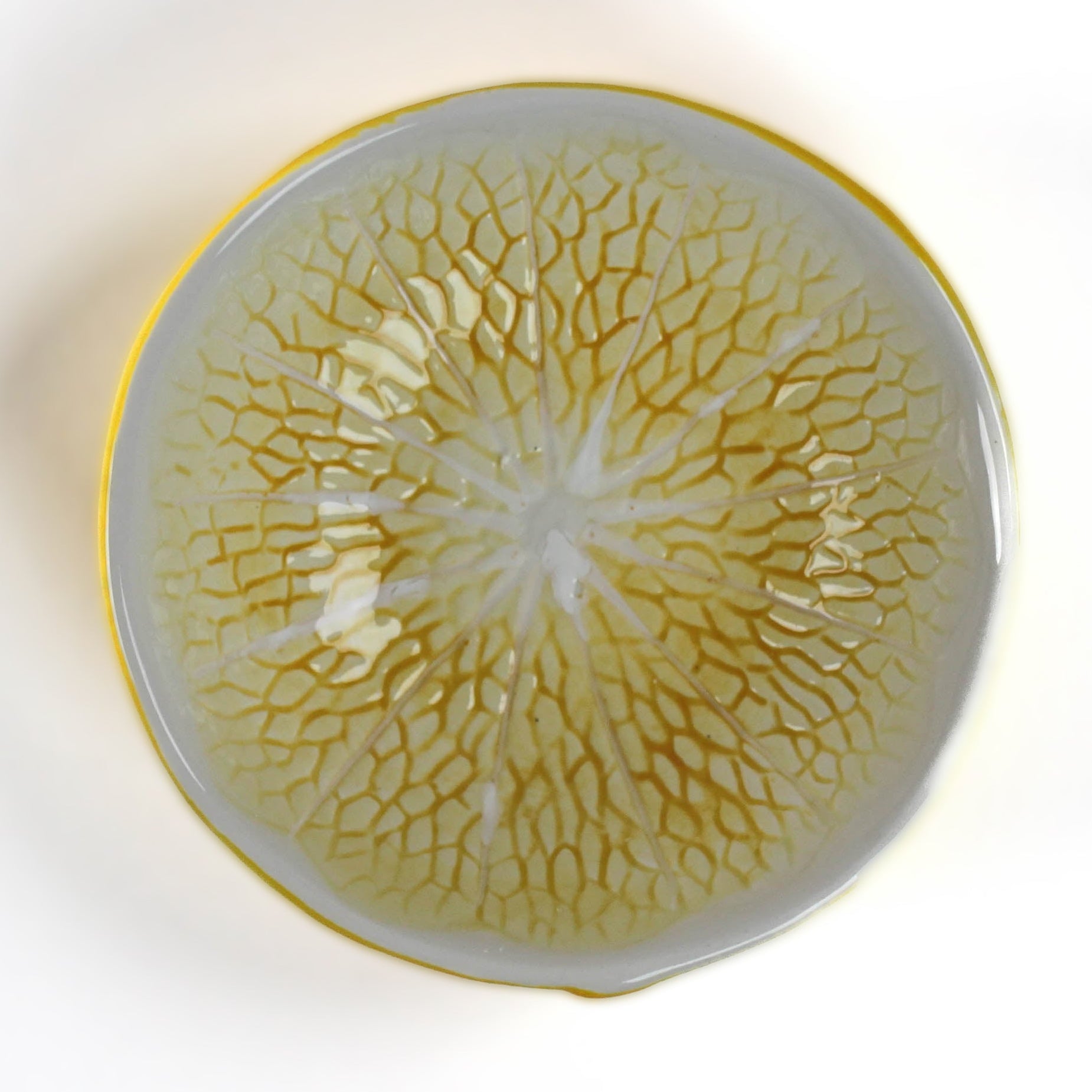  a lemon shaped ceramic bowl