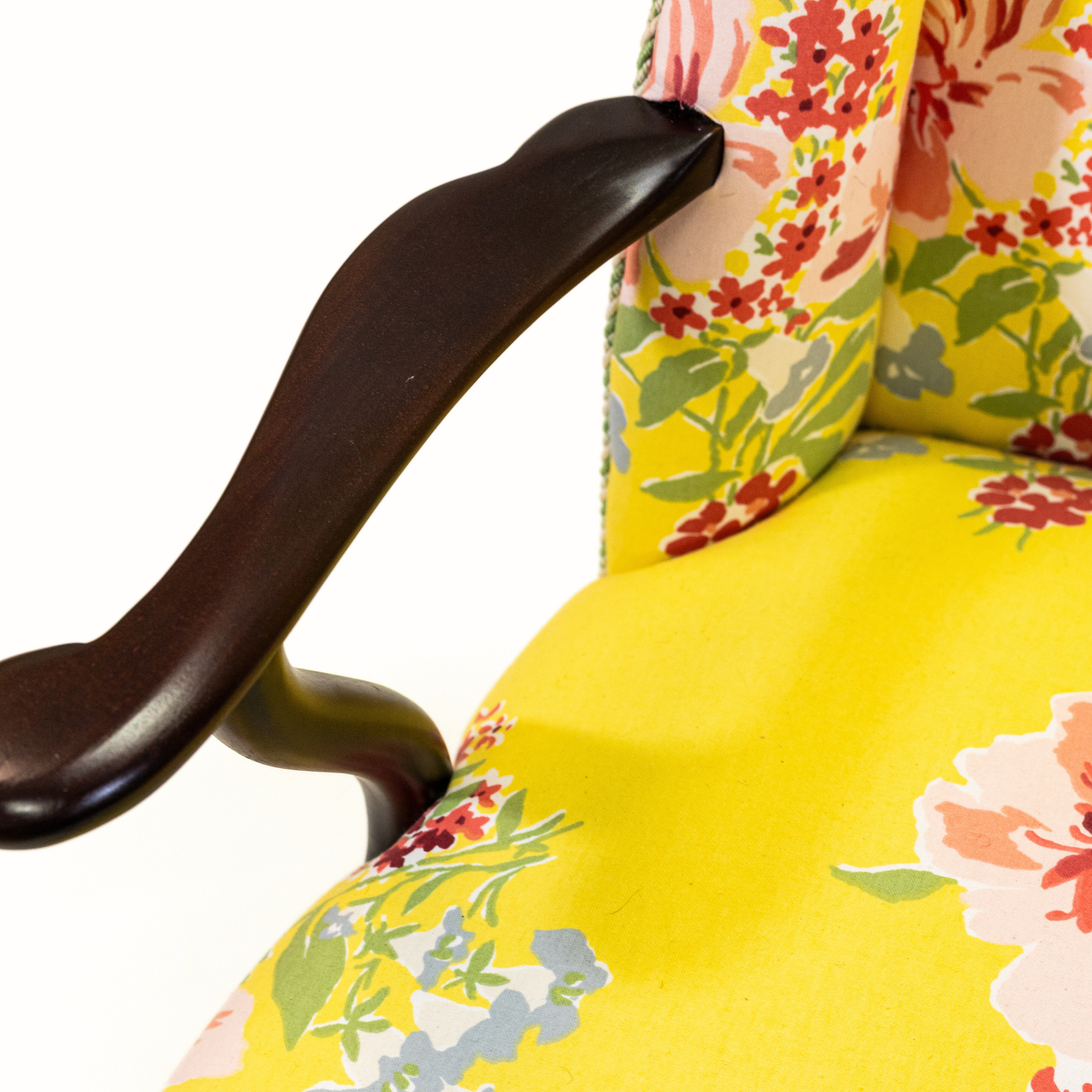 a yellow vintage floral armchair