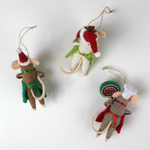 back of the three festive felt mouse ornaments wear holiday outfits—one holds a gingerbread cookie, another a giant lollipop, and the third a Christmas pudding