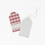 A pink gingham patterned gift tag with a white space for personalization, 1 showing the back