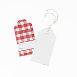 A red gingham patterned gift tags with a white space for personalized message with 1 showing the back
