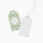 2 gift tag with a geometric lattice pattern in green, with a space for personalized message. 1 showing the front and the other showing the back