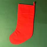 back of the Red and green chinoiserie Christmas stocking with a pagoda design on a green background
