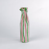 Madcap Cottage Striped wine glass bag  with green, pink, and white pattern on a white background