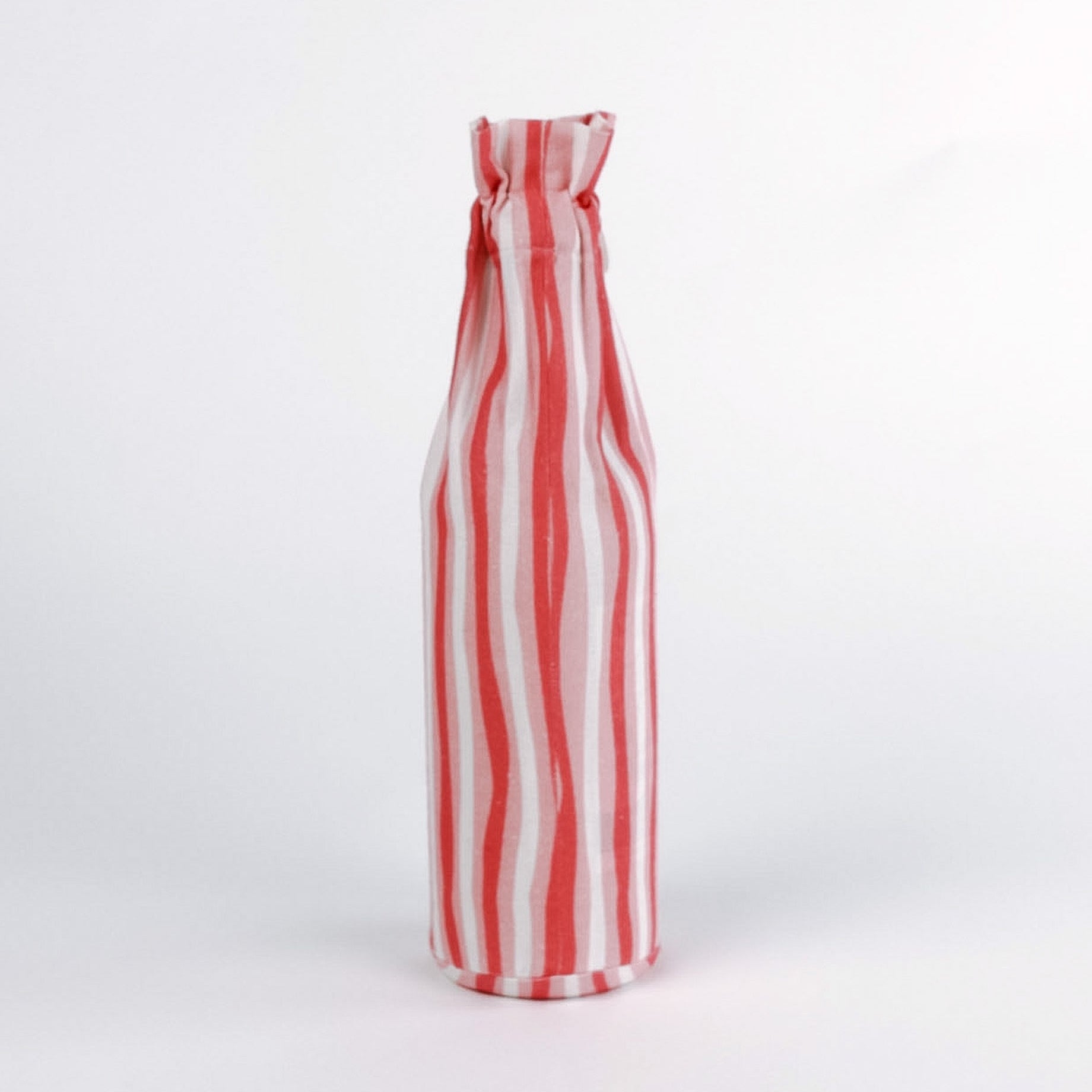 Madcap Cottage Red and white striped bottle bag on a white background
