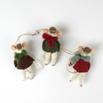 back of the Three felt mouse ornaments wearing cozy sweaters with festive designs—a snowman, a tree, and a snowflake—each topped with a tiny acorn cap and ready to hang.
