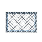 a blue and white floral paper placemats on a white background