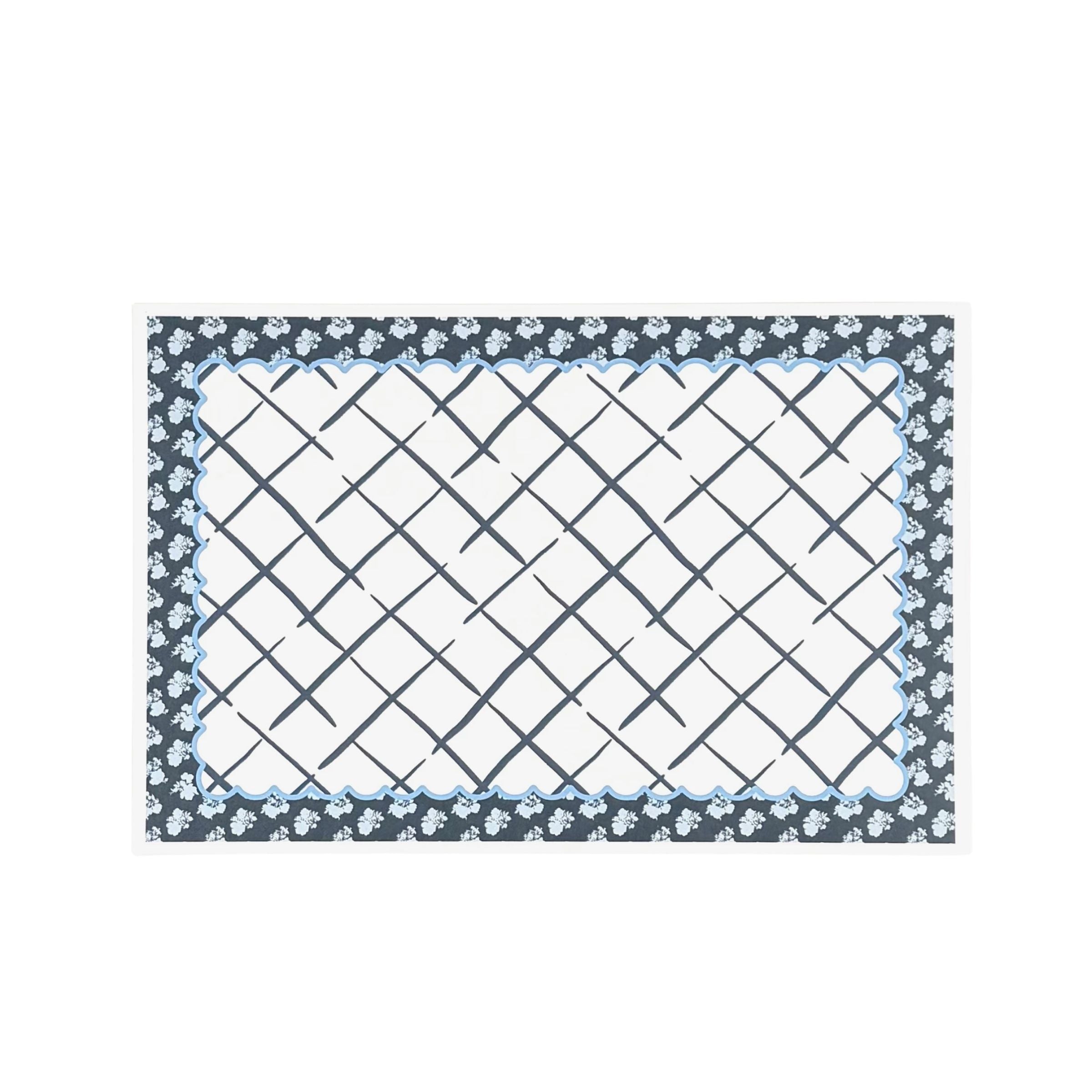a blue and white floral paper placemats on a white background