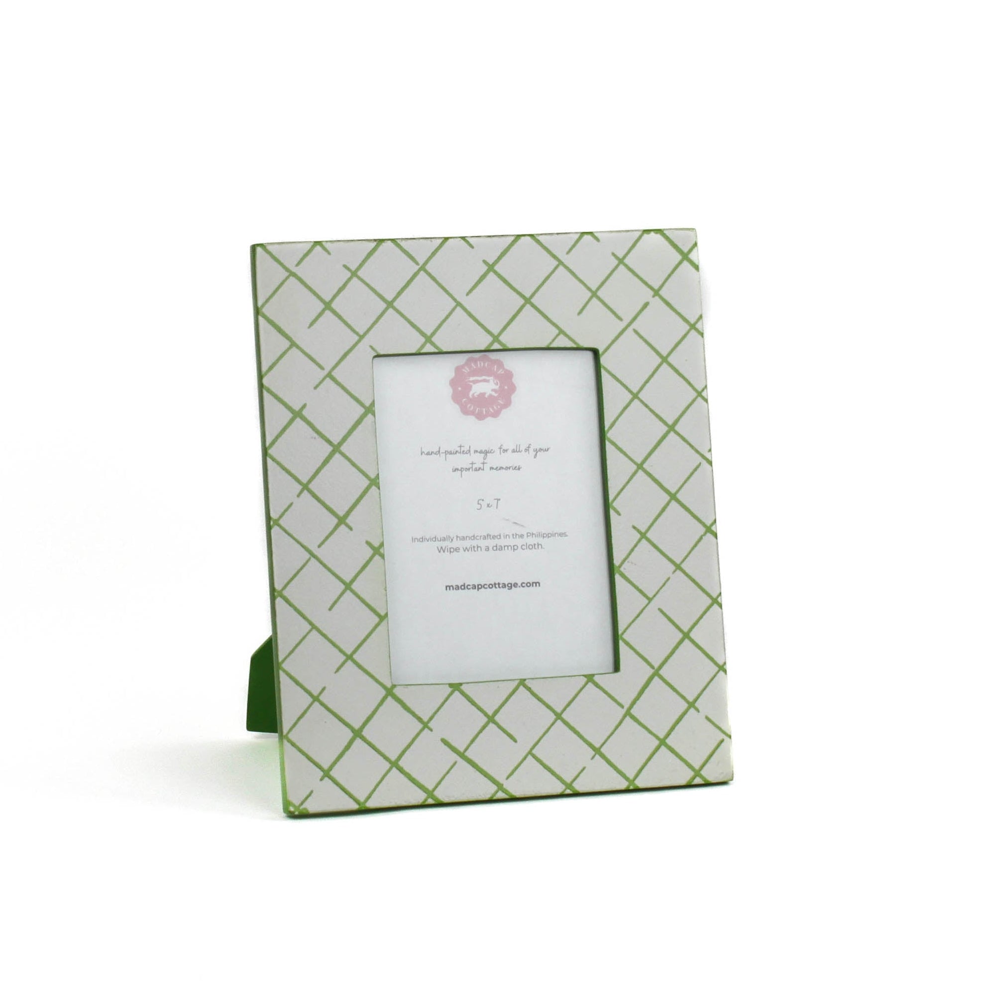 an 5' by 7' Bahama Court hand painted photo frames on a white background